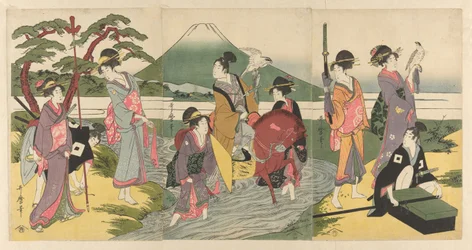 Junger Mann und seine Gruppe überqueren einen Bach vor dem Berg Fuji