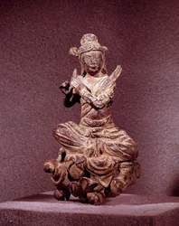 Koreanische Kunst: Darstellung einer Apsara in goldenem Bronze, Celeste. Silla-Periode (7.-10. Jahrhundert). Nationalmuseum von Korea