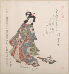 Mädchen und ein Hagoita (japanisches Federballspiel)