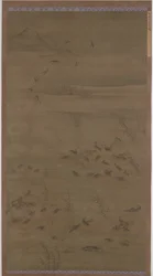 Gänse, die auf Sand landen