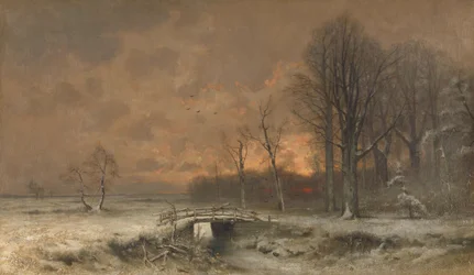 Winterszene mit der untergehenden Sonne hinter Bäumen