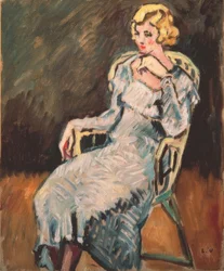 Sitzende junge Frau