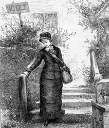 Eine Frau, die ein Haus zur Miete betrachtet