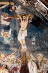 Der unbußfertige Dieb, gekreuzigt mit Jesus, seine Seele wird von einem Dämon aus seinem Mund gerissen. Darstellung des bösen Diebes namens Gesmas oder Gestas. Fresko vom Meister des Sacro Speco. 14. Jahrhundert. Obere Kirche. Kloster von Saint Benedetto (