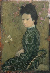 Eva Meurier in einem grünen Kleid