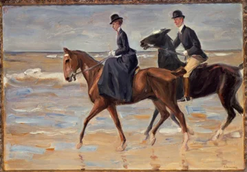 Reiter und Reiterin am Strand