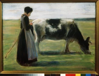 Ein Mädchen mit einer Kuh