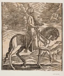 Reiter mit Turban, mit einem Schwert an seiner rechten Seite, Profil nach rechts; zwischen den Vorderbeinen des Pferdes kommen zwei Pyramiden in Sicht