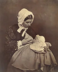 Paul Nadar an der Brust seiner Amme