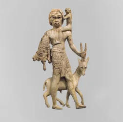 Statuette eines Mannes mit einem Oryx, einem Affen und einem Leopardenfell, ca. 8. Jahrhundert v. Chr.