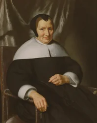 Porträt einer Dame, die in einem Sessel sitzt