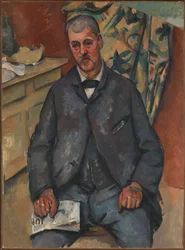 Sitzender Mann