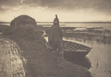 Marschbewohner auf dem Weg, Schoof-Gras zu schneiden