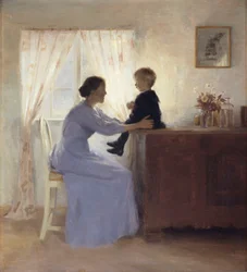 Eine Mutter mit Kind in einem Innenraum