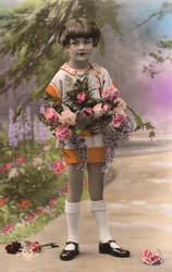Junger französischer Junge mit Rosen