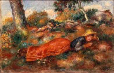 Junges Mädchen auf dem Gras liegend