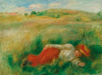 Frau im Gras sitzend