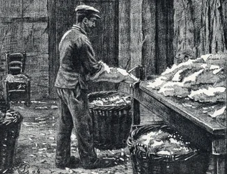 Leder: Spalten von Kaninchenfellen zur Lederherstellung, Gravur aus "Excursion à travers les métiers" von Pierre Calmette, Privatsammlung