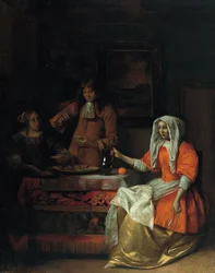 Innenraum mit zwei Frauen und einem Mann, der Austern isst und trinkt