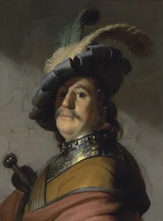 Ein Mann mit Harnisch und Mütze