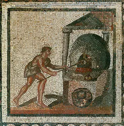 Brot in den Ofen schieben