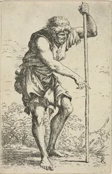 Ein alter, zerlumpter Mann mit einem Stab und einem Boden an seiner Hüfte, aus Figurina