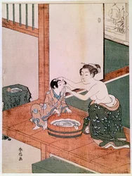 Eine nackte Mutter wäscht ihr Kind in Japan neben einem mit Wasser gefüllten Becken. Drucke von Haronobu Suzuki (1725-1770). 1766-1768. Paris, Guimet Museum, Nationalmuseum für asiatische Kunst