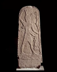 Orientalische Kunst: Stele des Gottes Baal im Blitz. (Gott Krieger schützt den König) Skulptur aus dem 15. Jahrhundert v. Chr., Syrien. Paris, Musee Du Louvre