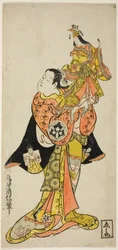 Der Schauspieler Yamashita Kinsaku hält eine Puppe der Kaiserin im Stück "Tagebuch einer Seereise nach Izu (Funadama Izu Nikki)," aufgeführt im Nakamura-Theater im ersten Monat, 1725