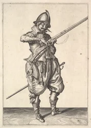 Ein Soldat auf Wache, der das Zündholz zwischen Daumen und Zeigefinger formt, aus den Scharfschützen s....