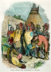 Mandan-Indianer mit Medizinmann im Bärenfell, um 1875