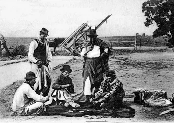 Drei Männer spielen Karten, Uruguay, um 1900er