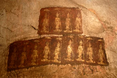 Theravada-Buddhismus; antikes Wandgemälde; stehender Buddha Shakyamuni; Mudra; Varada; Wunschgewährungs-Geste; Tham Pa Höhle; bei Nong Thang; Provinz Xieng Khouang; Laos; Südostasien; Asien
