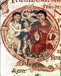 Ein Diener schenkt dem Herrn ein Getränk ein. Miniatur aus dem „Lectionaire de la Cathedrale de Reims“ 11. Jahrhundert Reims, Stadtbibliothek