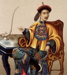 Chinesischer Aristokrat sitzt und raucht Opium - 19. Jahrhundert