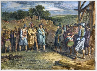 Ureinwohner Amerikas: Indianer. Die Siedler trafen Massasoit (1590-1661), auch bekannt als Ousamequin „Gelbe Feder“, Häuptling des Wampanoag-Stammes, Plymouth-Kolonie, Jahre 1620. Wampanoag-Anführer Massasoit besucht Kolonisten in Plymouth
