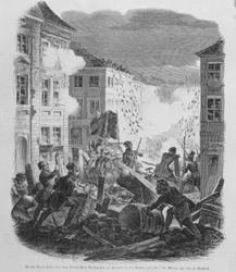 Revolution im März 1848: Barrikade in Berlin am 19.03.1848. Friedrich Wilhelm IV. von Preußen wird gezwungen, die Wiedervereinigung und eine liberale Regierung zu akzeptieren.