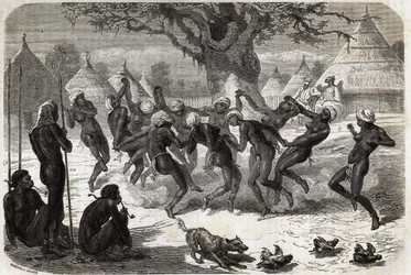 Willkommenstanz der Frauen des Stammes, bei der Rückkehr von Baker und seiner Frau vom Albertsee (Albert Nyanza). Gravur zur Illustration der Reise zum Albertsee, in den Jahren 1861-1864, von Sir Samuel White Baker, in „Le tour du monde, nouveau journal de