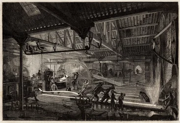 Die Herstellung der Schienen in den alten Schmieden von Le Creusot, die Stahlstreifen, weiß vor Hitze, werden zwischen den Walzwerken zu Schienen gestreckt. Gravur zur Illustration einer Reise nach Le Creusot und den Minen von Saone und Loire, 1865, von L.