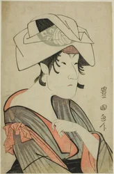 Nakayama Tomisaburo. Als Frau verkleidet mit einem Handtuch auf dem Kopf