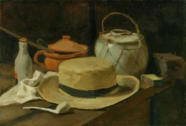 Stillleben mit gelbem Strohhut