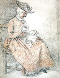 Sitzende Frau beim Nähen